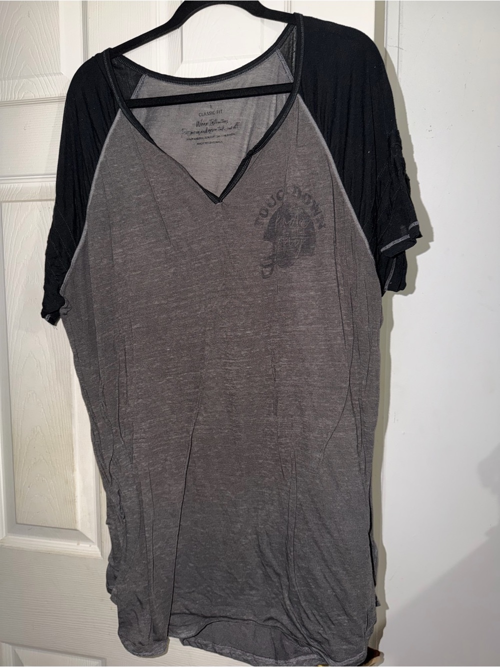 torrid Gray Tee with Black Raglan Sleeves and Subtle Chest Graphic
